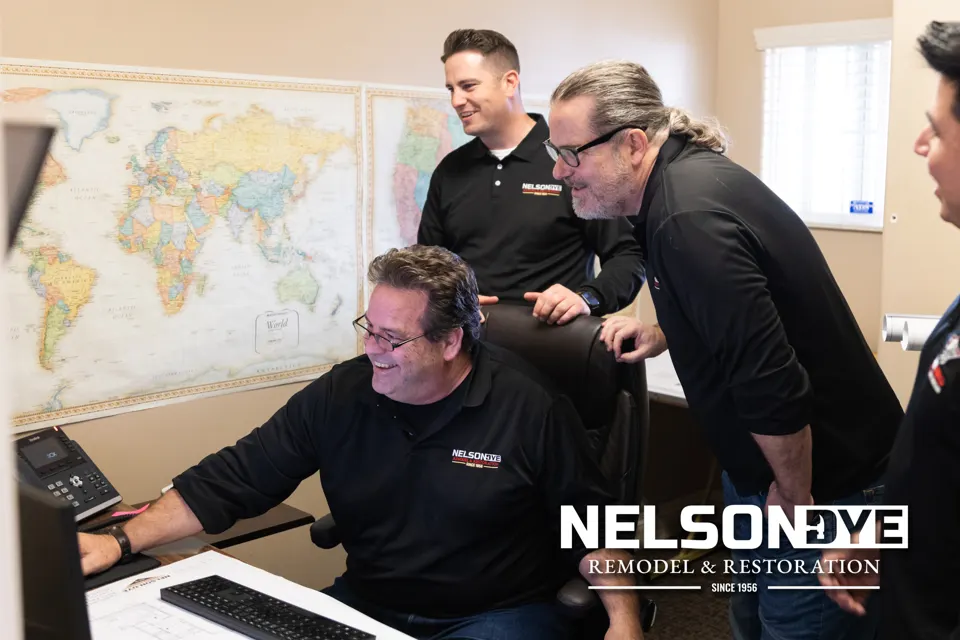 Nelson Dye team reviewing a project